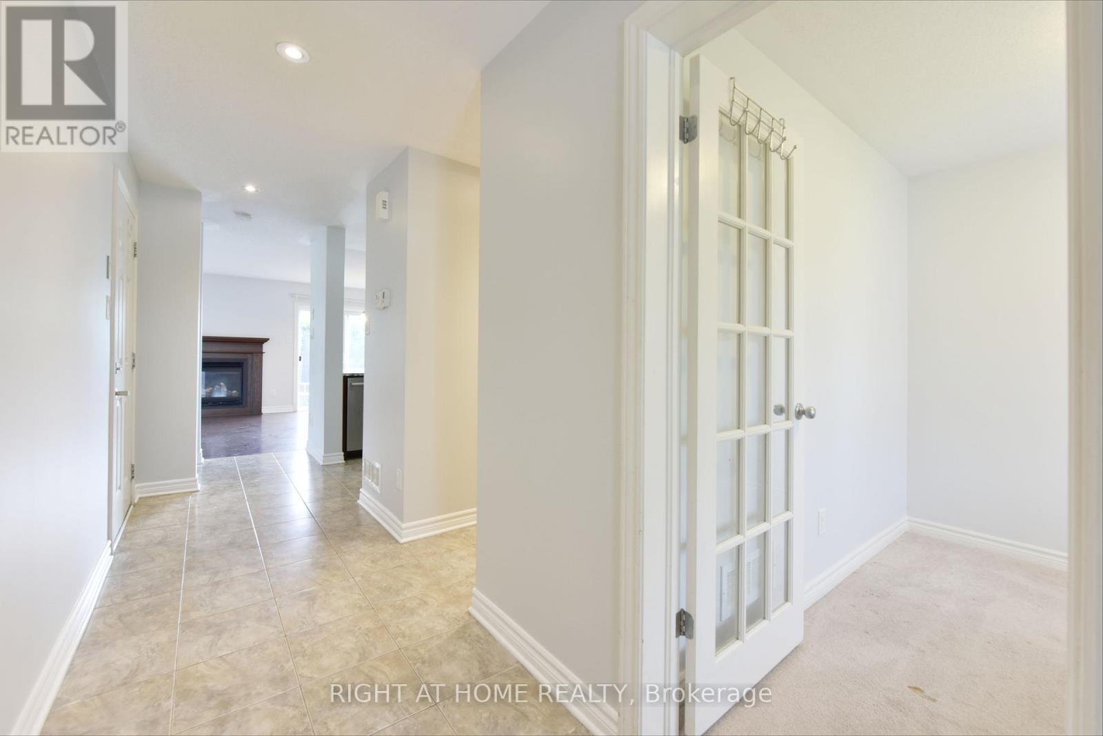 322 Brettonwood Ridge, Ottawa, ON - Indoor Photo Showing Other Room With Fireplace