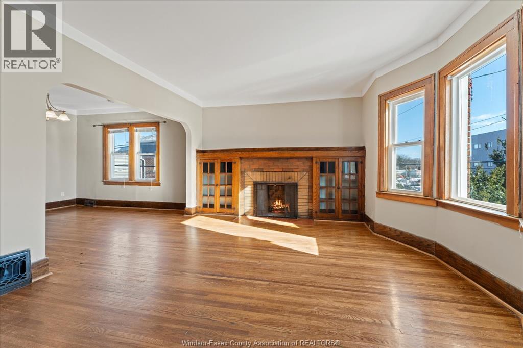 232-234 Giles, Windsor, ON - Indoor Photo Showing Living Room With Fireplace