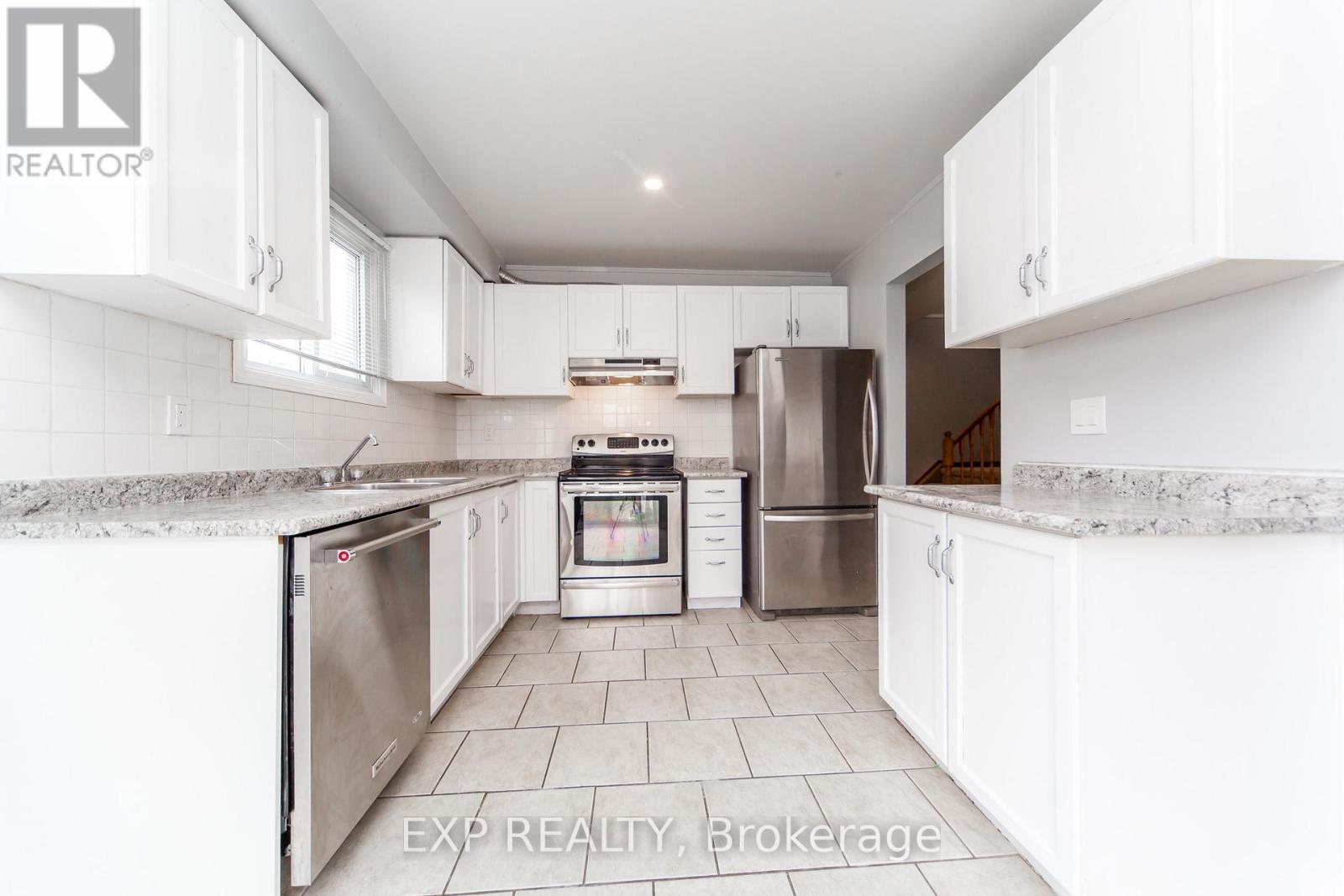 1447 Fleming Court, Oshawa, ON - Indoor Photo Showing Kitchen With Stainless Steel Kitchen With Upgraded Kitchen