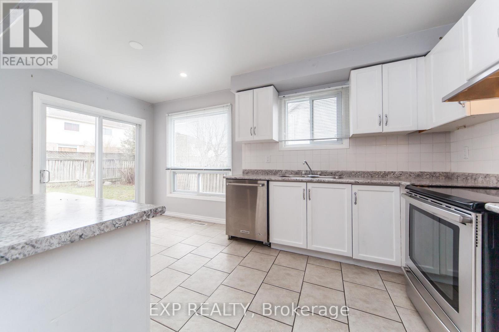 1447 Fleming Court, Oshawa, ON - Indoor Photo Showing Kitchen With Stainless Steel Kitchen