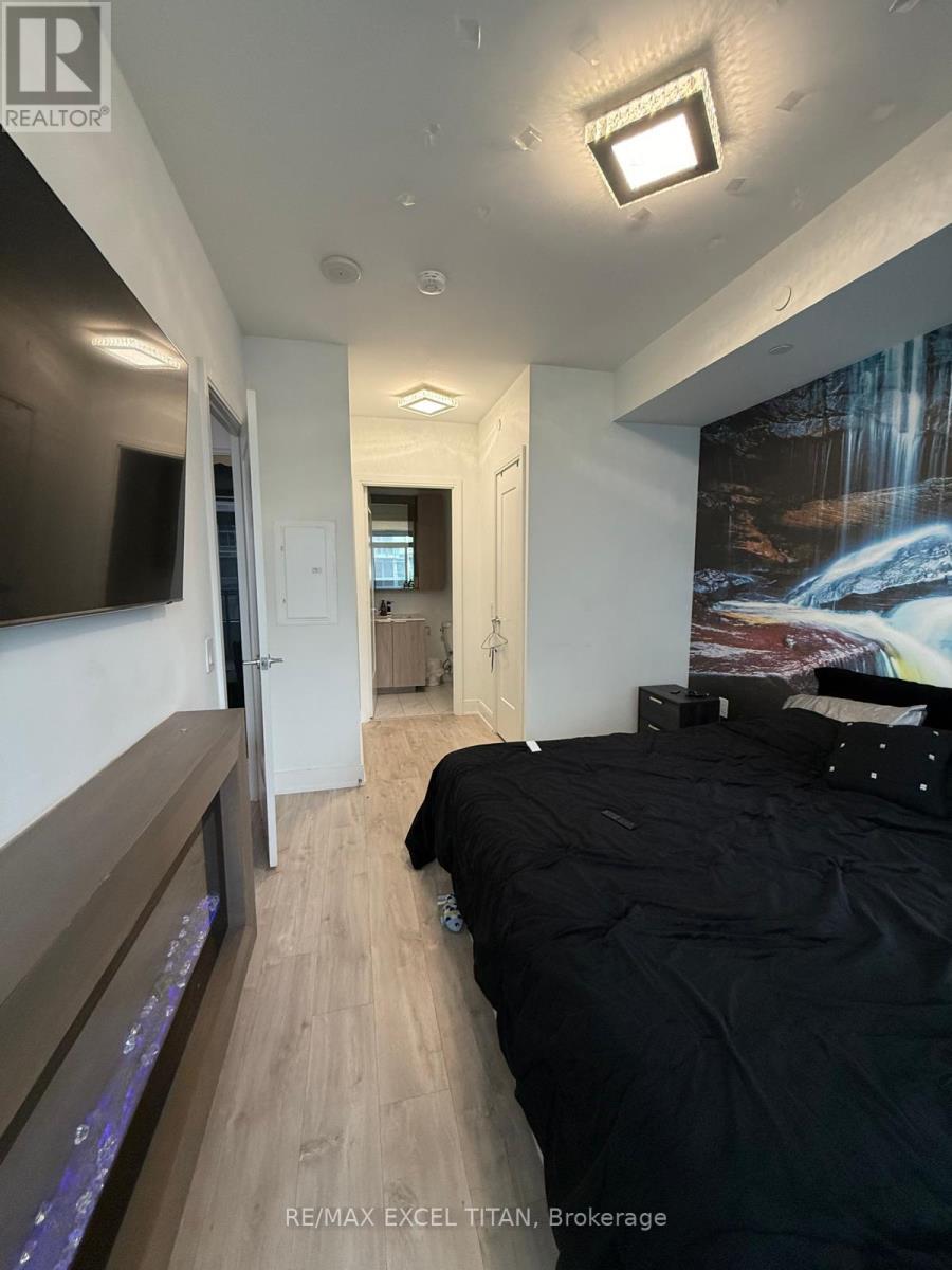 906 - 65 Annie Craig Drive, Toronto, ON - Indoor With Fireplace