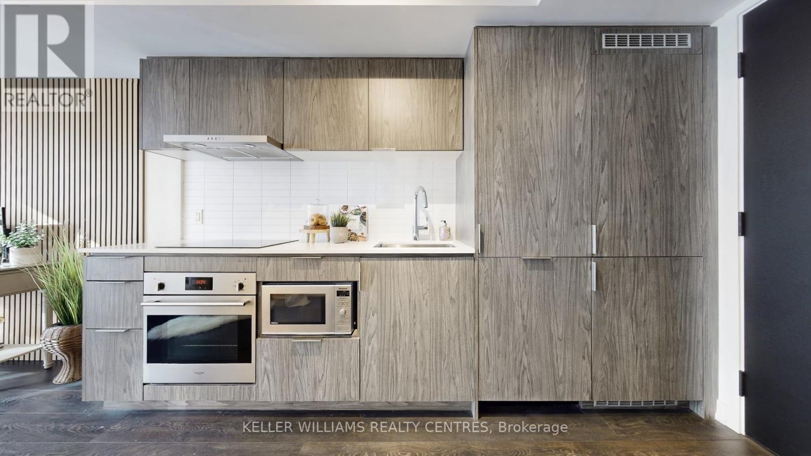 built in stove and dishwasher and fridge - 2510 - 60 Shuter Street, Toronto, ON - Indoor Photo Showing Other Room