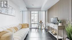 living space with decorative acoustic wall panels -