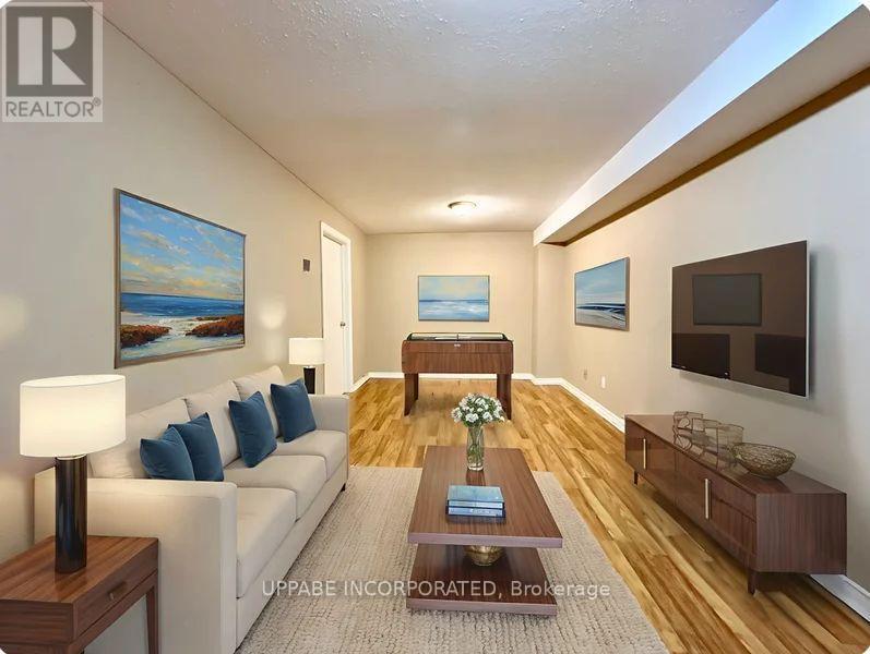 Virtually Staged - 102 - 1795 Marsala Crescent, Ottawa, ON - Indoor Photo Showing Living Room