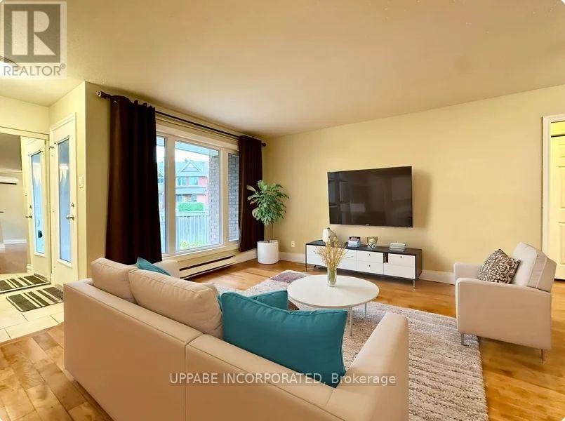 Virtually Staged - 102 - 1795 Marsala Crescent, Ottawa, ON - Indoor Photo Showing Living Room