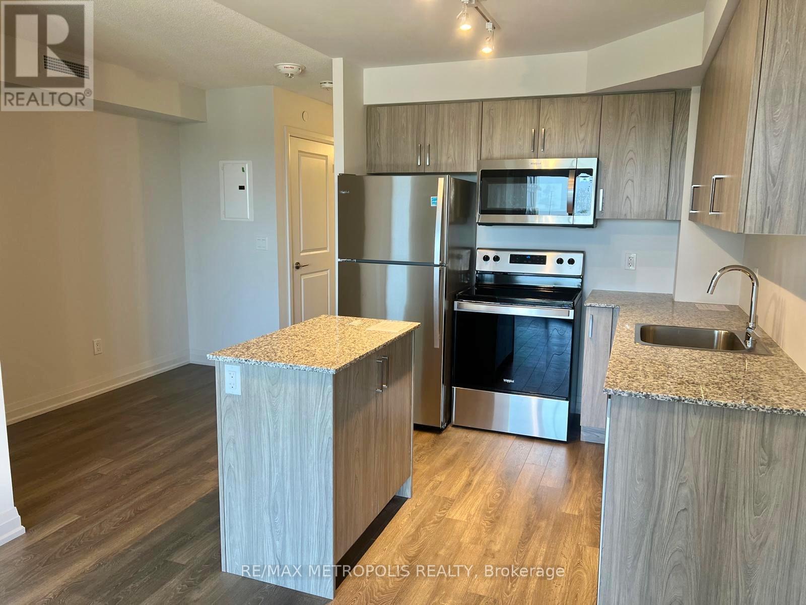 723 - 20 Meadowglen Place, Toronto, ON - Indoor Photo Showing Kitchen