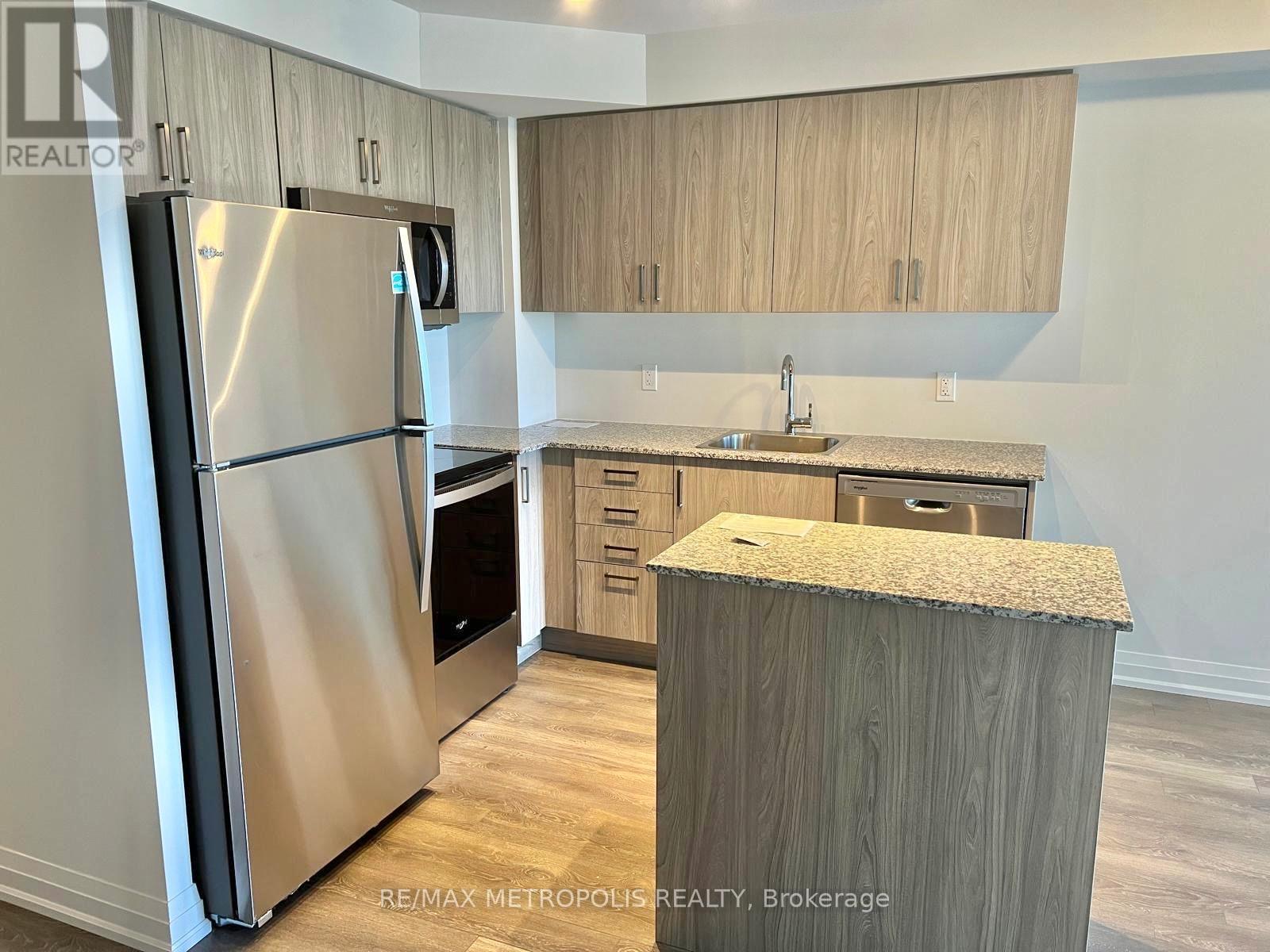 723 - 20 Meadowglen Place, Toronto, ON - Indoor Photo Showing Kitchen