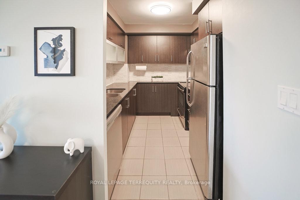 411-275 Yorkland Road, Toronto, ON - Indoor Photo Showing Kitchen With Double Sink