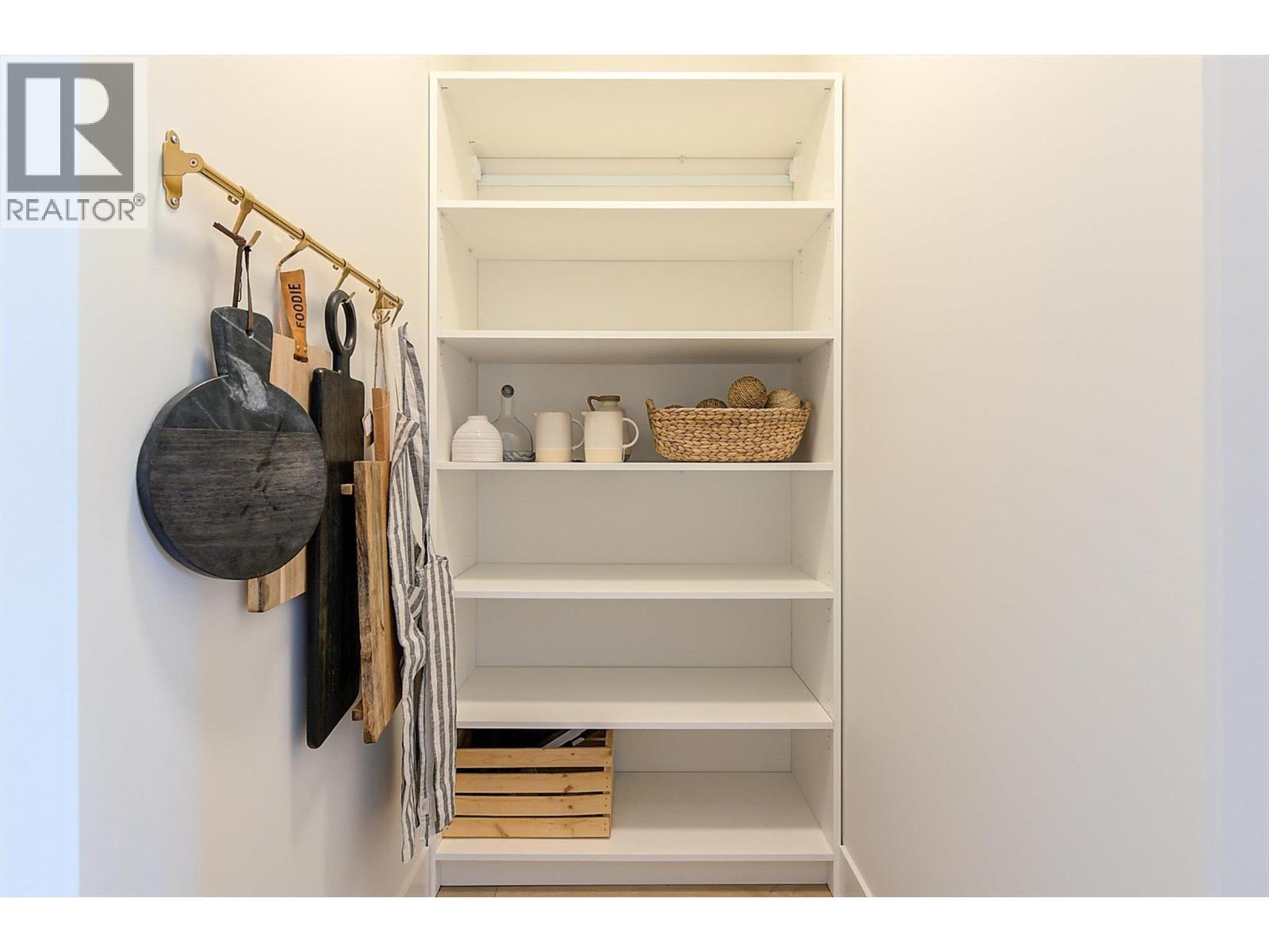 Walk in Pantry. Staged photos are of 759 Barnaby Rd - 761 Barnaby Road, Kelowna, BC - Indoor With Storage