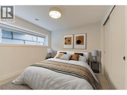 Entry level bedroom 1 - Staged photos are of 759 Barnaby Rd -