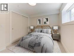 Entry level bedroom 2 - Staged photos are of 759 Barnaby Rd -