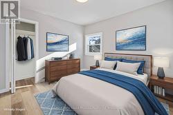 2nd bedroom, main lvl, virtually staged -