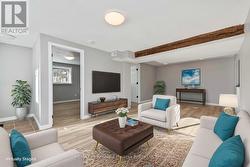 Family room, lower level, virtually staged -