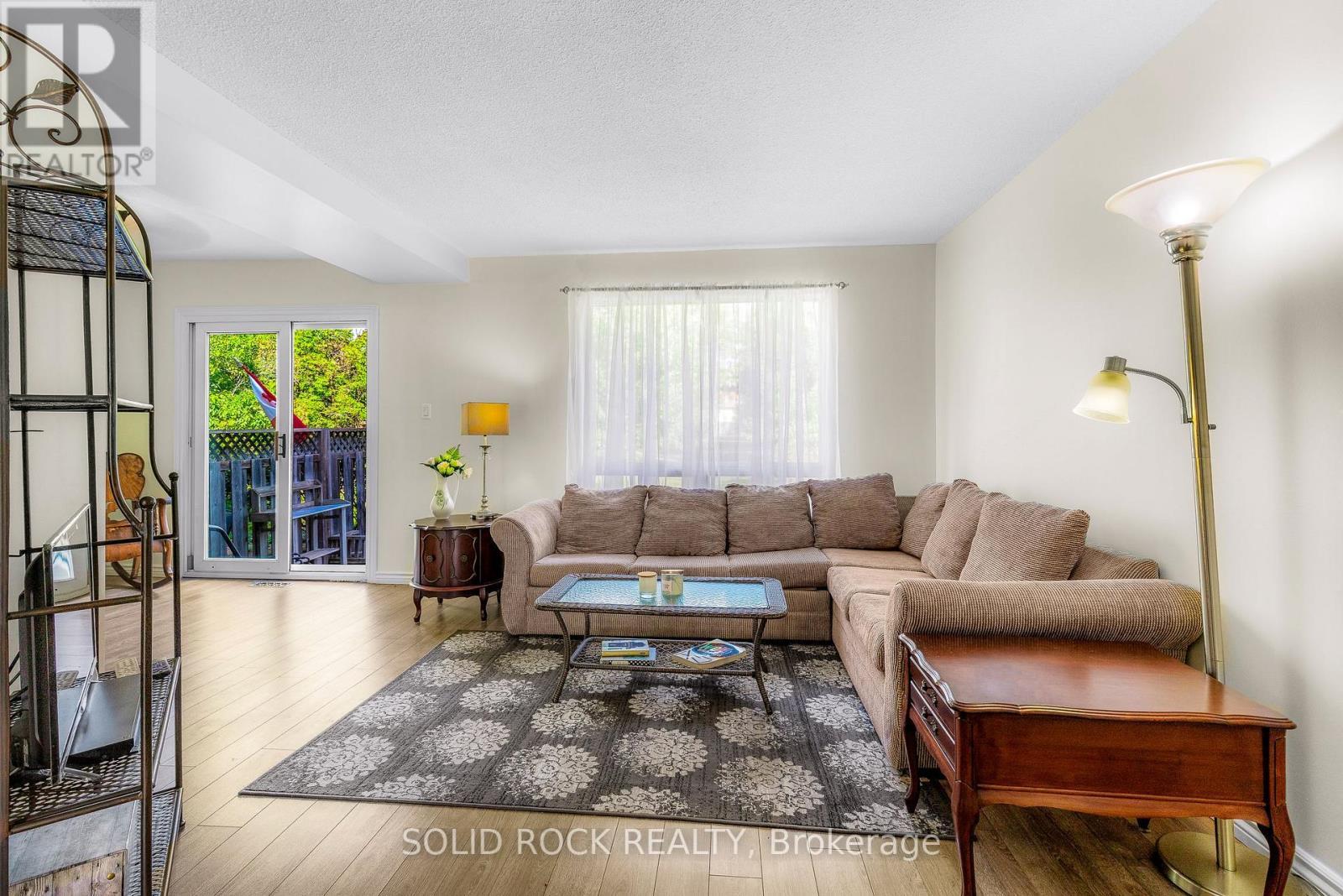 Living/dining area with huge window & patio door - 29 Windfield Crescent, Kingston (Kingston East (Incl Barret Crt)), ON - Indoor Photo Showing Living Room