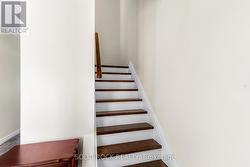 Solid wood stairs to upper level -