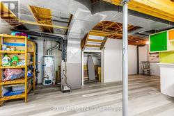 Lower level utility/storage area-nat gas furn -