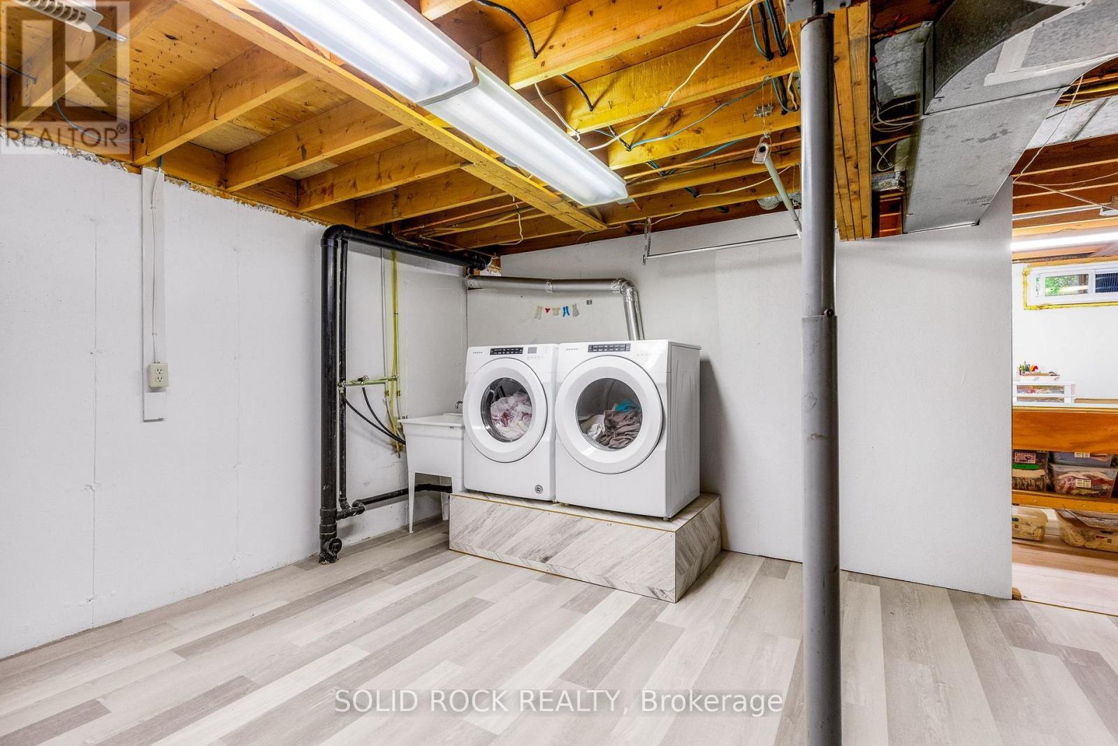 Lower level-new hi-end flooring 2025 - 29 Windfield Crescent, Kingston (Kingston East (Incl Barret Crt)), ON - Indoor Photo Showing Laundry Room