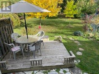 Path leads to huge municipal greenspace - 29 Windfield Crescent, Kingston (Kingston East (Incl Barret Crt)), ON - Outdoor With Deck Patio Veranda