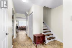 Foyer leads to living/kitch-2 pc bath entr to gar -