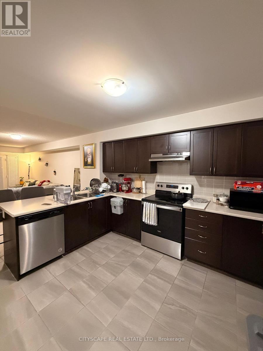 57 - 250 Sunny Meadow Boulevard, Brampton, ON - Indoor Photo Showing Kitchen With Double Sink
