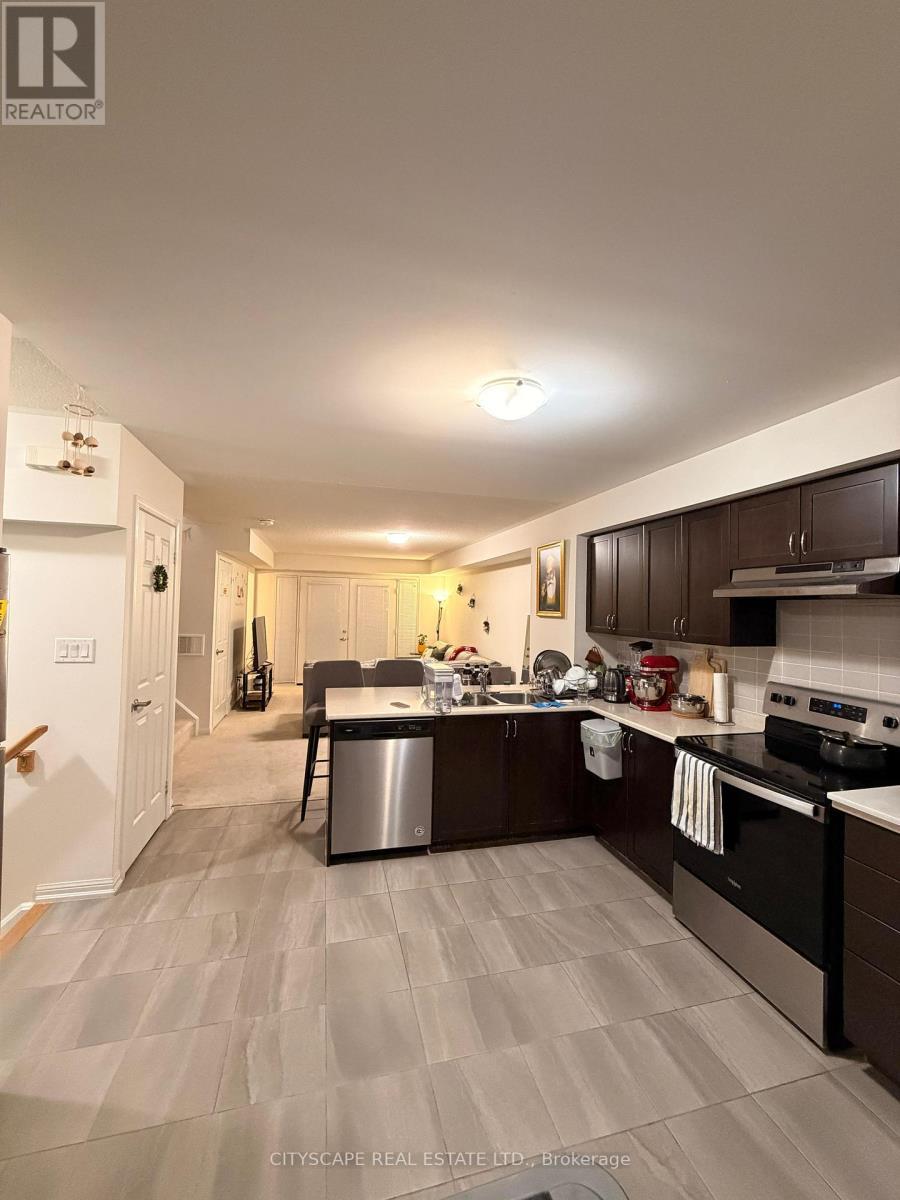 57 - 250 Sunny Meadow Boulevard, Brampton, ON - Indoor Photo Showing Kitchen With Double Sink