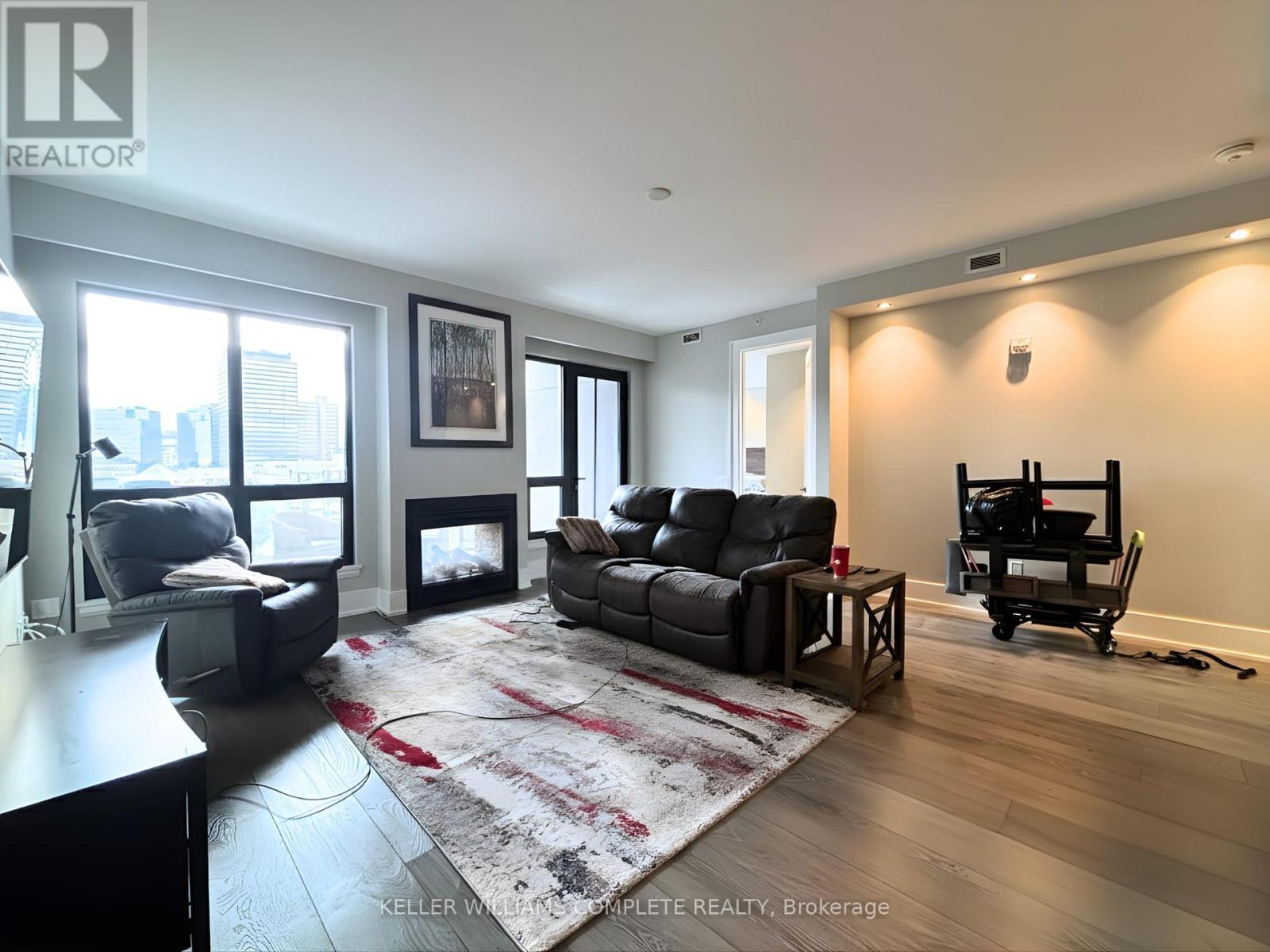 Ph4 - 181 James Street N, Hamilton, ON - Indoor Photo Showing Living Room With Fireplace