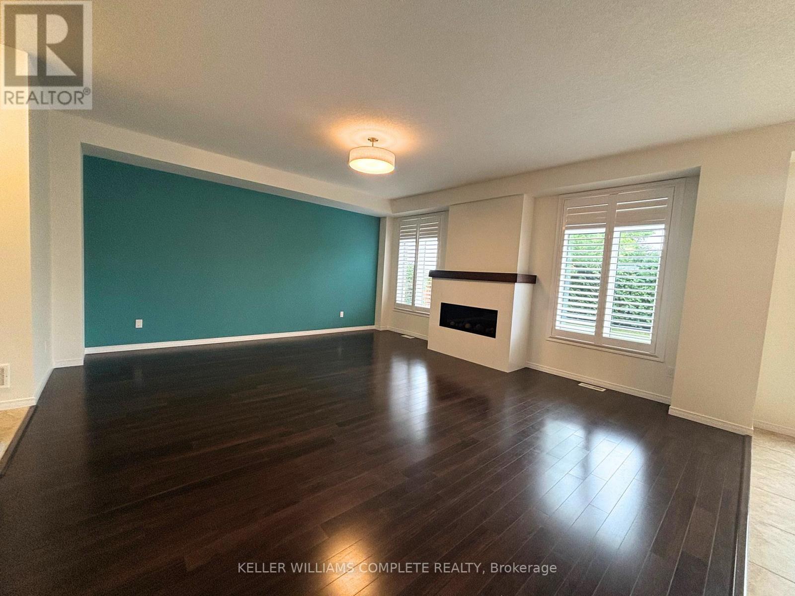 23 Irongate Drive, Brant, ON - Indoor With Fireplace