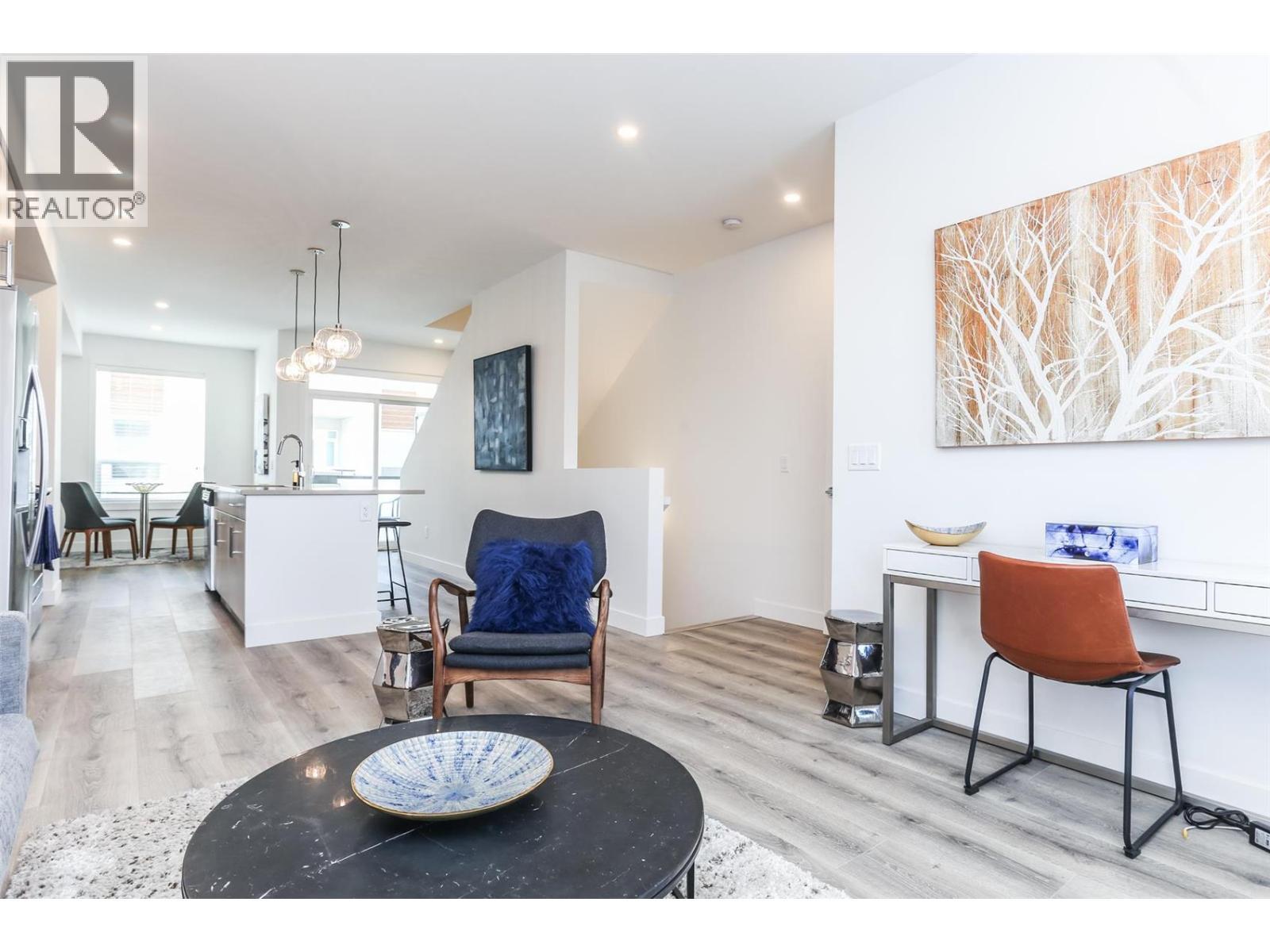 Similar too - 610 Academy Way Unit# 111, Kelowna, BC - Indoor Photo Showing Living Room