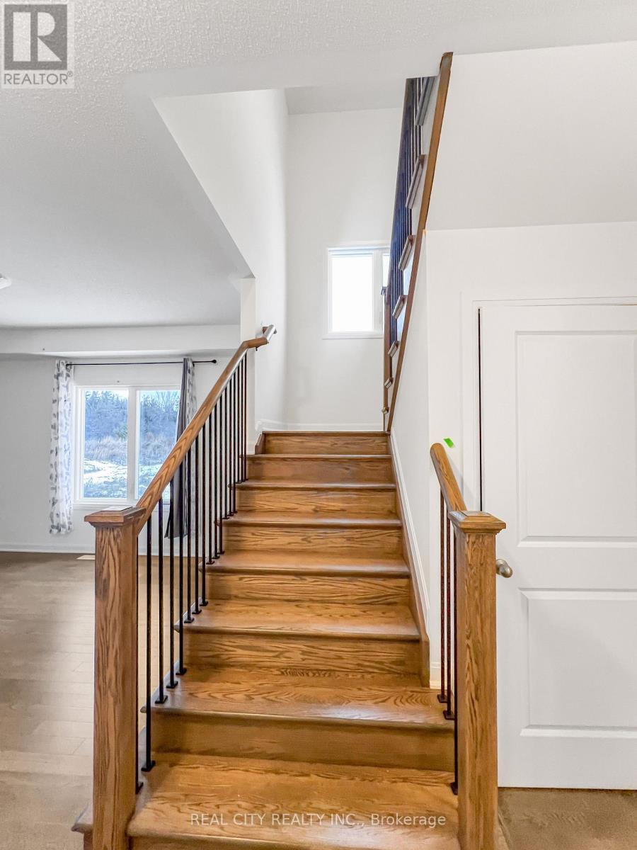 Staircase - 88 Royal Oak Crescent, Loyalist, ON - Indoor Photo Showing Other Room