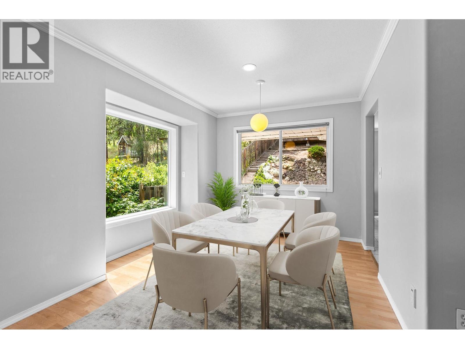 Digitally staged - 125 Applecrest Court, Kelowna, BC - Indoor Photo Showing Dining Room