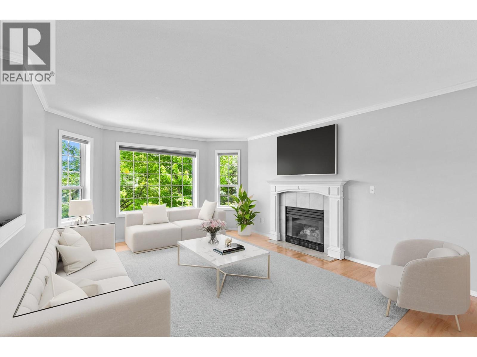 Digitally staged - 125 Applecrest Court, Kelowna, BC - Indoor Photo Showing Living Room With Fireplace