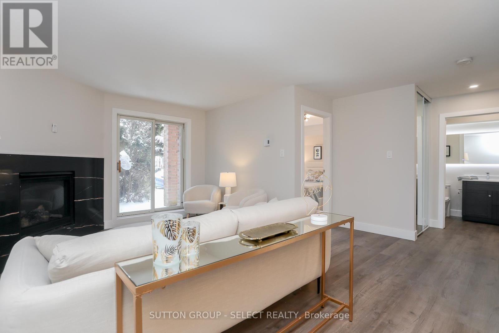 202 - 2228 Trafalgar Street, London East (East I), ON - Indoor Photo Showing Living Room With Fireplace
