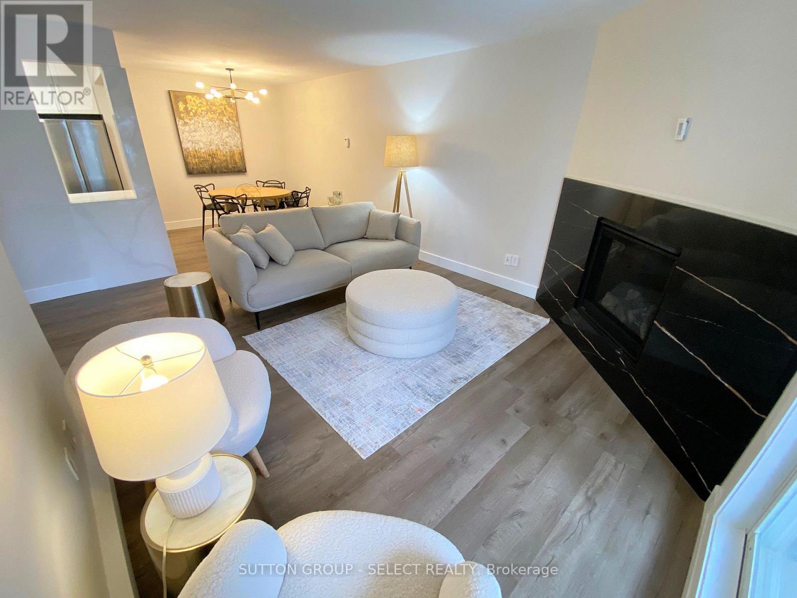 202 - 2228 Trafalgar Street, London East (East I), ON - Indoor Photo Showing Living Room With Fireplace