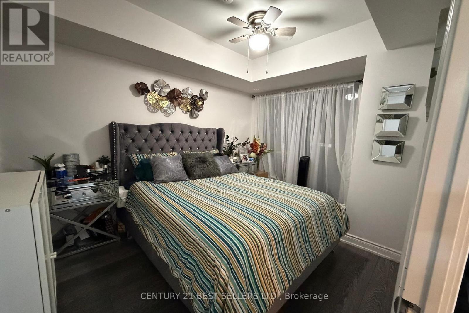 218 - 1050 Main Street E, Milton, ON - Indoor Photo Showing Bedroom