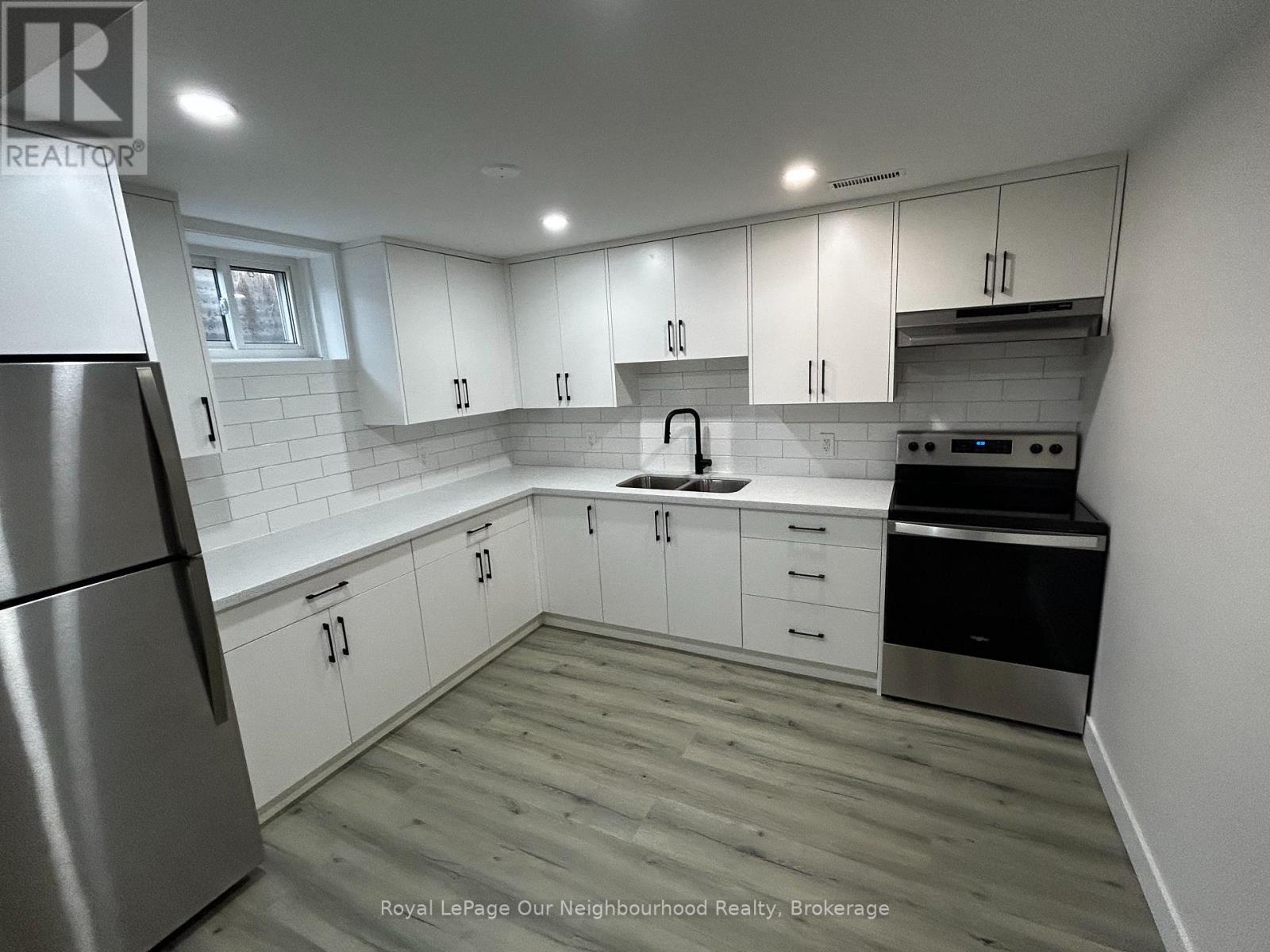 Basement - 670 Emerson Court, Oshawa (Donevan), ON - Indoor Photo Showing Kitchen With Double Sink