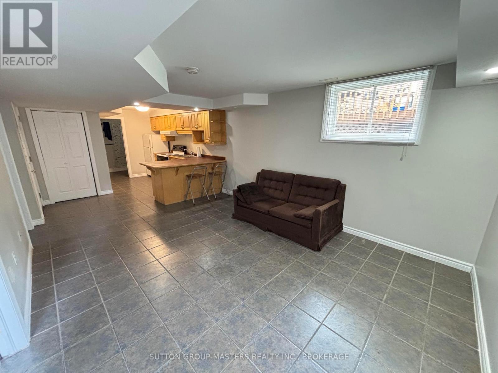 Basement kitchen & common area w/ heated floors - 160 Nelson Street, Kingston (Central City East), ON - Indoor
