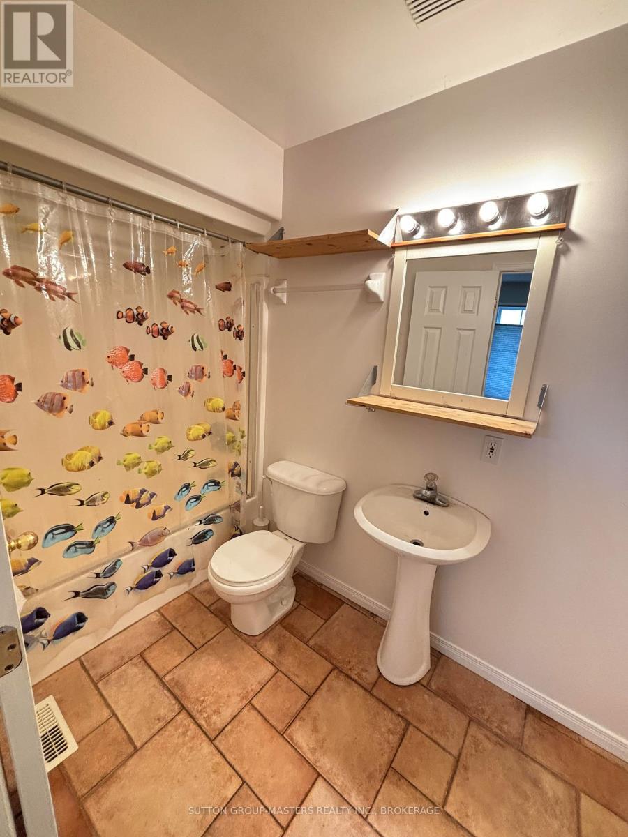 Main floor bedroom#1 w/ 4 piece ensuite - 160 Nelson Street, Kingston (Central City East), ON - Indoor Photo Showing Bathroom