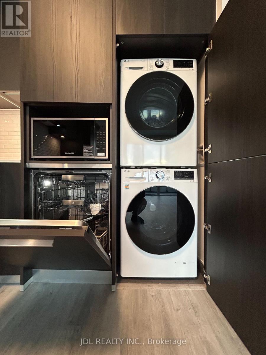 1210 - 65 Broadway Ave Boulevard, Toronto, ON - Indoor Photo Showing Laundry Room