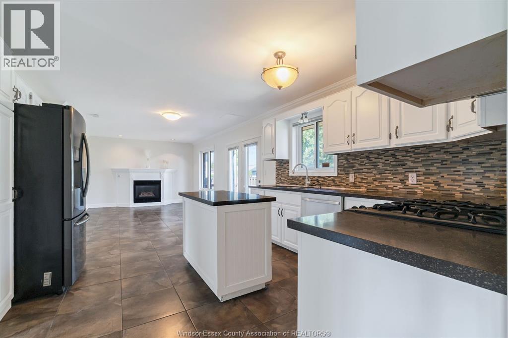 28 Carter Avenue, Leamington, ON - Indoor Photo Showing Kitchen With Fireplace