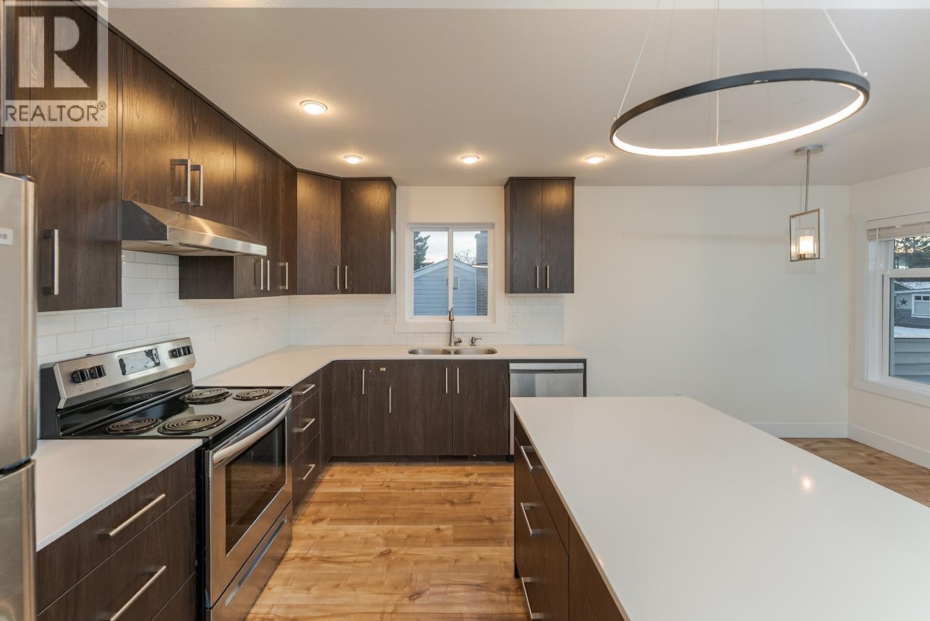 1396 Douglas Street, Prince George, BC - Indoor Photo Showing Kitchen With Double Sink With Upgraded Kitchen