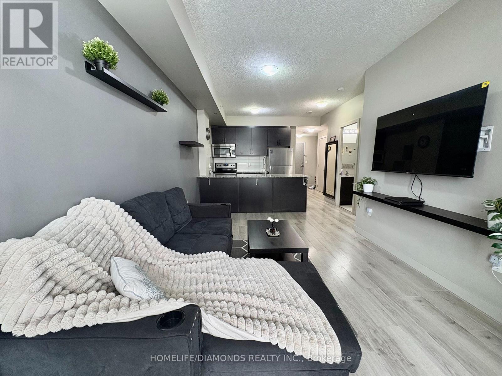 811 - 150 Water Street N, Cambridge, ON - Indoor Photo Showing Living Room