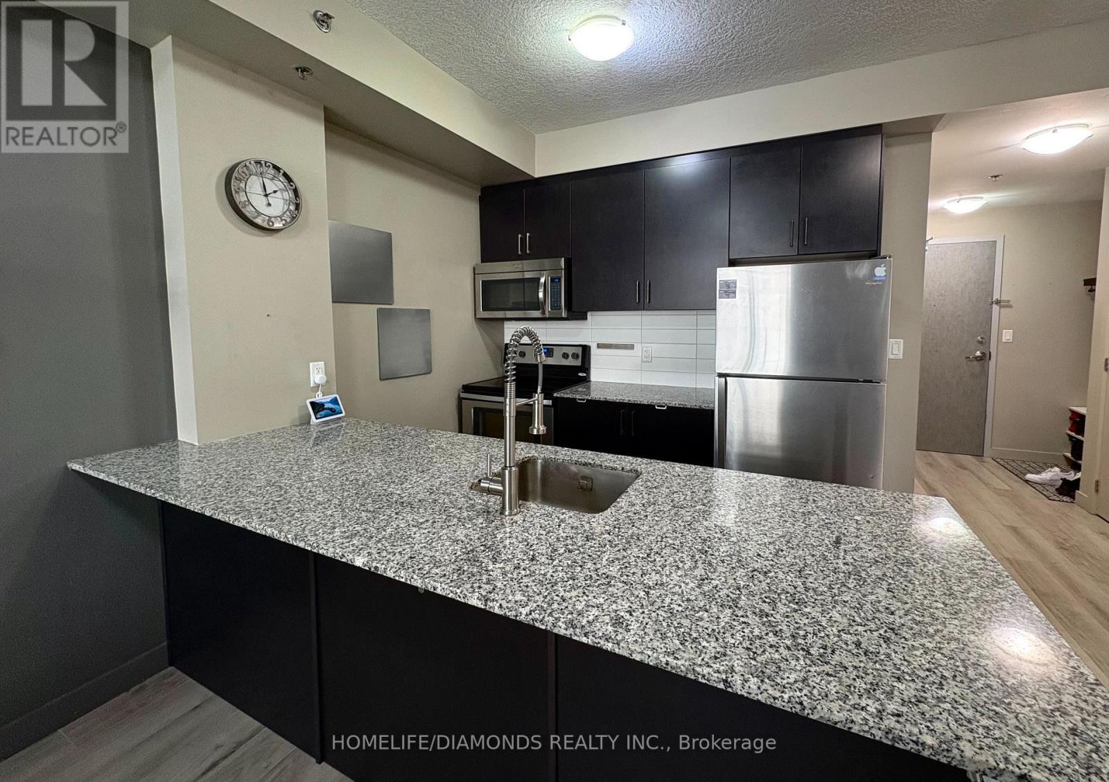 811 - 150 Water Street N, Cambridge, ON - Indoor Photo Showing Kitchen With Stainless Steel Kitchen