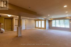 Large bright lower level family room with walkout. -