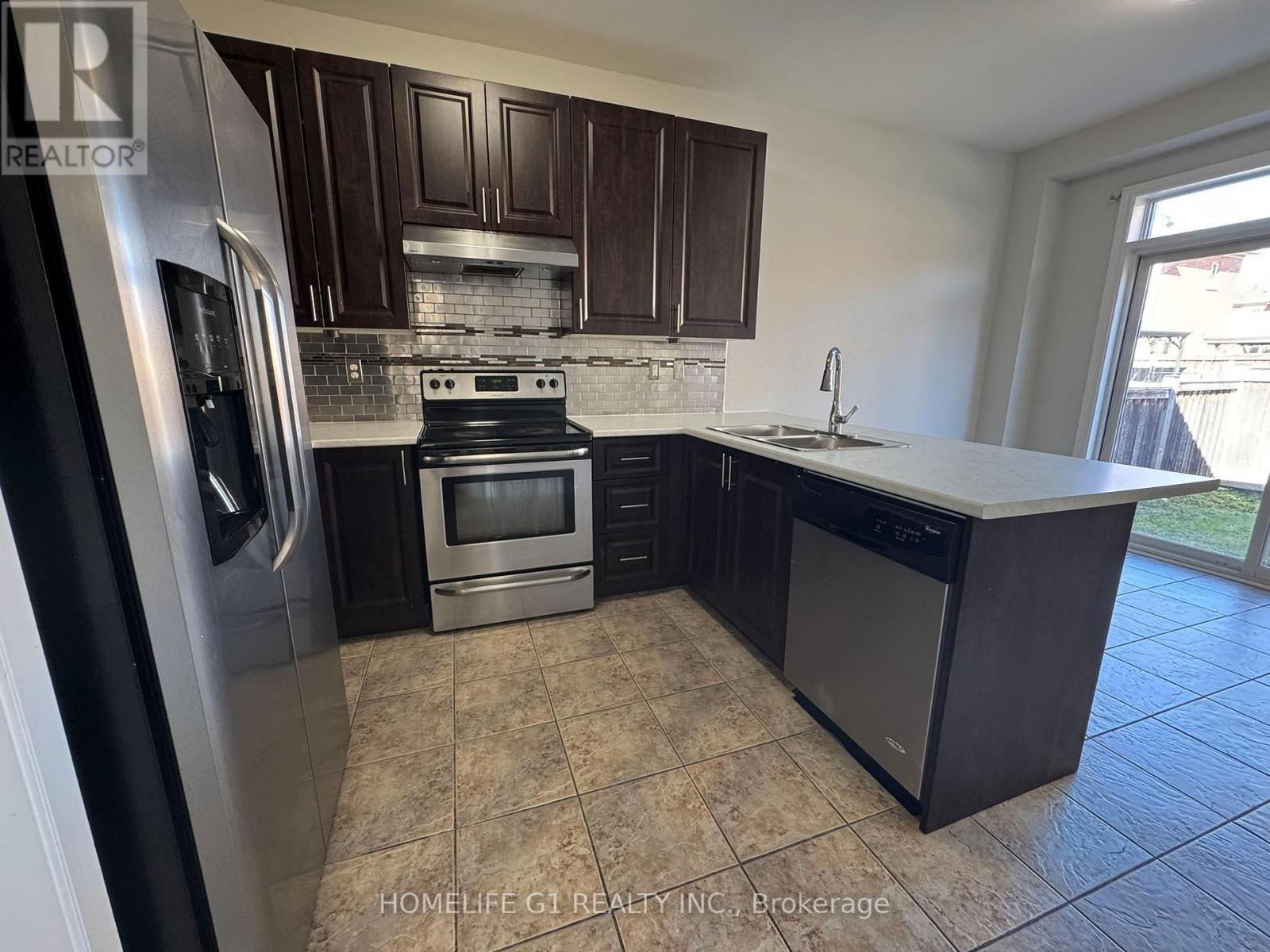 7 Bryony Road, Brampton, ON - Indoor Photo Showing Kitchen With Stainless Steel Kitchen With Double Sink