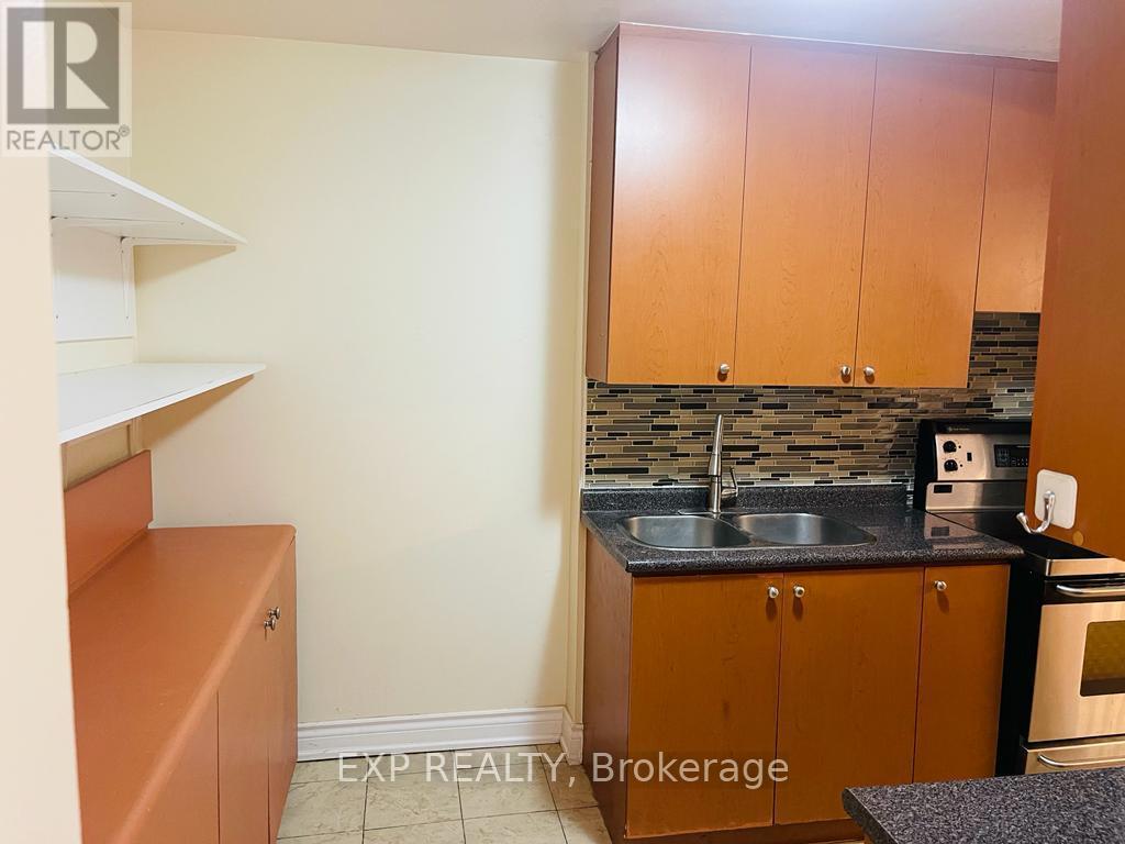 330 - 3025 The Credit Woodlands Road, Mississauga, ON - Indoor Photo Showing Kitchen With Double Sink