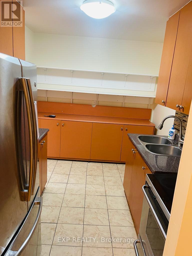 330 - 3025 The Credit Woodlands Road, Mississauga, ON - Indoor Photo Showing Kitchen With Double Sink