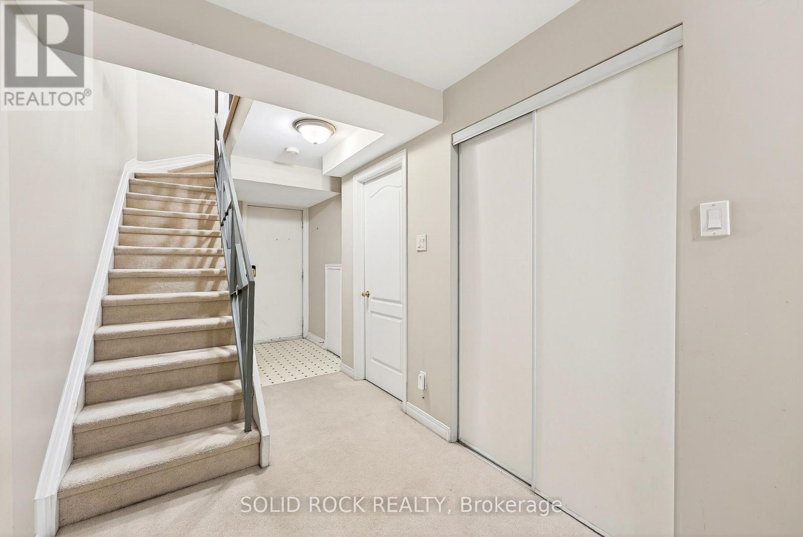Stairs to the lower level with garage inside entry - 395 Mackay Street, Ottawa, ON - Indoor Photo Showing Other Room