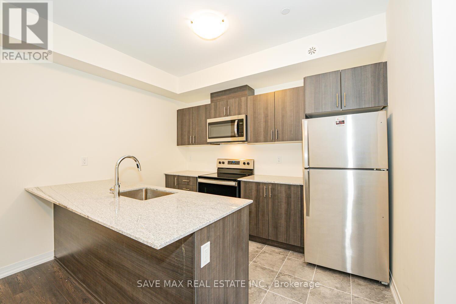 5 - 30 Liben Way, Toronto, ON - Indoor Photo Showing Kitchen With Stainless Steel Kitchen