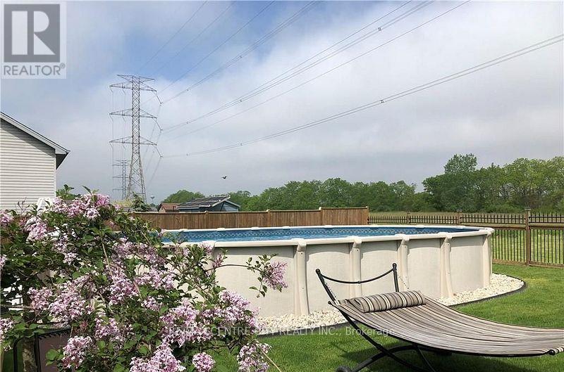 79 Donker Drive, St. Thomas, ON - Outdoor With Above Ground Pool