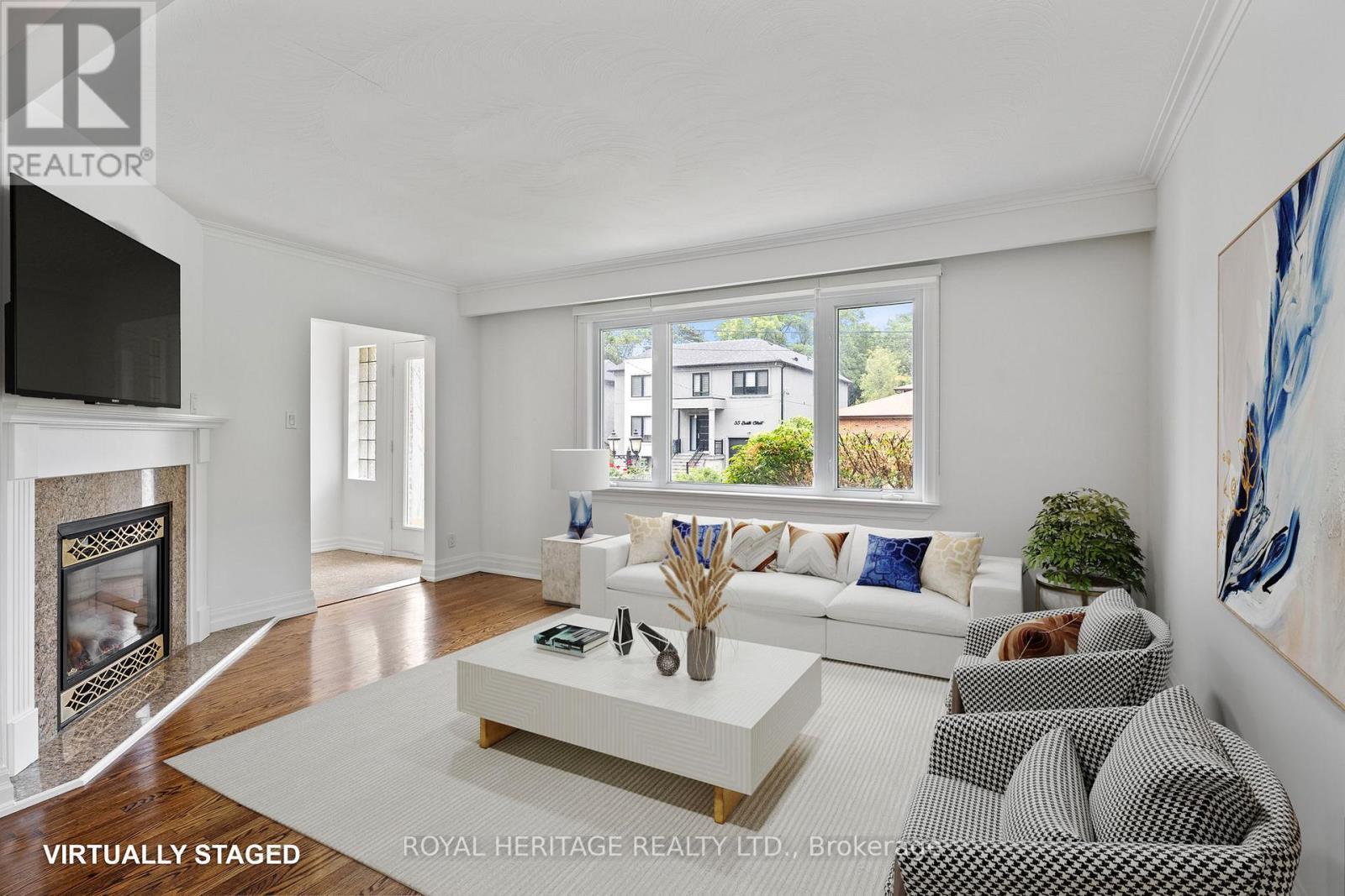 32 Beath Street, Toronto, ON - Indoor Photo Showing Living Room With Fireplace